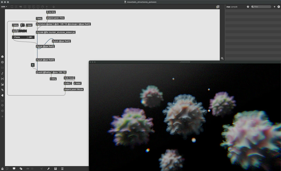 Max/MSP/Jitter patcher with a cluster of colorful fuzzy forms floating against black.